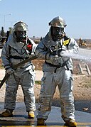 Turkish firefighters in MOPP 4 level protective gear during an exercise held at Incirlik Air Base, Turkey