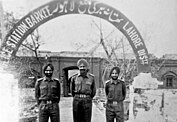 Lt. Col. Hari Singh of the Indian 18th Cavalry posing outside a captured Pakistani police station (Barkee) with fellow soldiers in Lahore District.