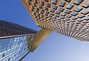 View from below the skybridge of the American Copper Buildings on a sunny day in 2018