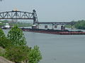 Image 14A barge hauling coal in the Louisville and Portland Canal, the only manmade section of the Ohio River (from Transportation in Kentucky)