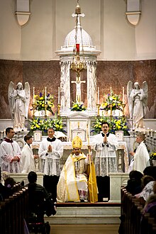 Bishop Fernandez preaches a homily during Solemn High Mass with Pontifical Assistance from the Throne at St. Leo Oratory