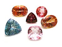 Facet cut topaz gemstones in various colors