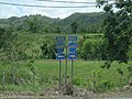 Signs for PR-6685 south and north at the western terminus of PR-643 in Río Arriba Saliente, Manatí