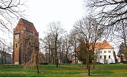 Szamotuły Castle seen from a park