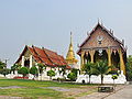 Two viharns and a chedi at Wat Phra That Chang Kham, Nan, Thailand