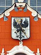 Coat of arms of the city on the facade