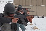 Afghan Police officers fire their PM md. 63 assault rifles.