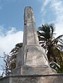 Monument text "REPUBLIQUE FRANÇAISE. 1893. A LA MÉMOIRE DES OFFICIERS, MARINS ET SOLDATS FRANÇAIS INHUMÉS DANS L'ILE DE SACRIFICIOS. 1838.-1867."