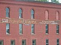 Signage detail on the northern elevation of the Brand Building