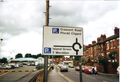 A picture of a Welsh language (y Gymraeg) road singe near Wrexham Central station in the year 2009.