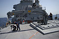 VLS Strikedown crane extended, aboard USS Hopper