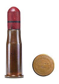 Um 10,4 mm Vetterli "shotshell" fabricado pela "Remington".