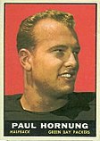 A color photo of a smiling Paul Hornung, with the text "Paul Hornung, Halfback, Green Bay Packers" in a black bar below the photo.