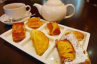 Apple pies served on partitioned tableware