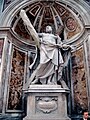 Saint Andrew carries the cross on which he was crucified. His bones are at St. Peter's