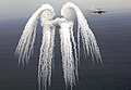 Wingtip vortices shown in flare smoke left behind a C-17 Globemaster III. Also known as smoke angels.