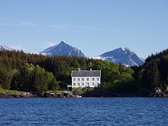 The old trading house at Lauvøy, surrounded by Sitka spruce