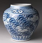 Chinese wave background on a mid-15th-century Ming vase