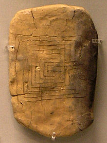 Reverse of a Linear B tablet: a labyrinth has been drawn onto it.