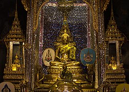 Principal Buddha image inside the Phra Viharn Luang, a replica of the sacred Phra Phuttha Sihing