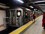 42nd Street Shuttle train of three ad-wrapped R62A cars at Grand Central in 2016