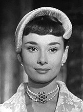 A still of Hepburn in character as Princess Ann in the film Roman Holiday
