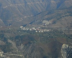 Krastë seen from the summit of Noi i Madh (1848 m), at a distance of 7.7 km (5 mi) as the crow flies.