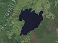 Image 45The scalloped bays indenting Lake Taupō's northern and western coasts are typical of large volcanic caldera margins. The caldera they surround was formed during the huge Oruanui eruption. (from Geography of New Zealand)