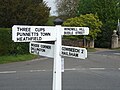 A traditional fingerpost showing nearby places.