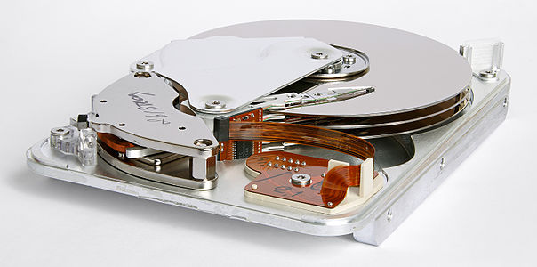 Inner view of a hard disk drive, by Eric Gaba