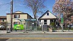 An FX bus station surrounded by a chain link fence while it was under construction