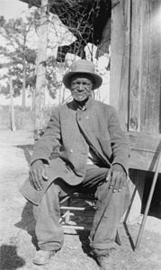 Wes Brady, former slave at Slave Narrative Collection, by Anonymous photographer of the Federal Writers' Project (edited by Chick Bowen)