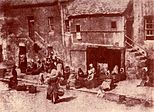 Fishwives in St Andrews bait their lines, 1844