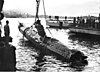 A Japanese midget submarine is raised from the bed of Sydney Harbour