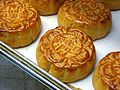 Mooncakes with Chinese characters 金門旦黃 (jinmen danhuang).