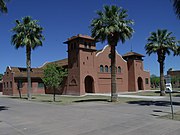 The Phoenix Indian School main building was built in 1891 and is located at 300 E. Indian School Rd. It was listed in the National Register of Historic Places on May 31, 2001, ref. #01000521.