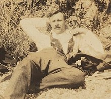 Snapshot by Ray Strachey of Saxon Sydney-Turner, reclining at the beach