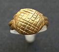Ring decorated with cross hatched lines