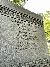 A large grave marker reading: Caroline Scott Harrison; October 1, 1832; October 25, 1892; Beloved Wife of Benjamin Harrison; Married October 20, 1853; First President General; Daughters of the American Revolution