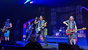 Less Than Jake performing in 2022. From left to right: J.R. Wasilewski, Buddy Schaub, Chris DeMakes, Matt Yonker, Roger Lima