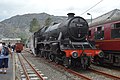 Leander is seen stood alongside the Ffestiniog Railway while waiting for 48151 to be coupled back onto the train and clear the line.