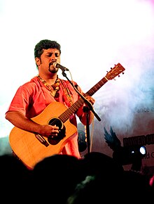 Dixit performing at a concert, 2010