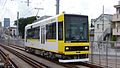 Car 8908 in yellow livery in August 2016