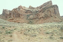 Syncline in Navajo Sandstone visible from the Syncline Campsite on the northwest side of the structure, facing south