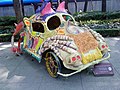 An Alebrije (Mexican artcraft) in the shape of a Volkswagen Beetle