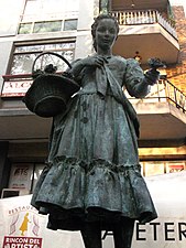 Raquel Meller fountain (1966), portrayed as a violets seller. Nou de la Rambla street, Barcelona.