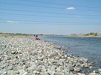 Part of Agno River flowing near Barangay San Vicente, Santa Maria Pangasinan. A faint image of Narciso Ramos Bridge can be seen at a distance.