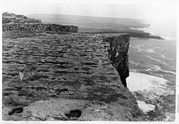 Black and white photograph taken on the cliffs at Dun Aonghasa in the Aran Islands