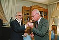 King Hussein lights Yitzhak Rabin's cigarette at the royal residence in Aqaba, shortly after the signing of the peace treaty, 26 October 1994