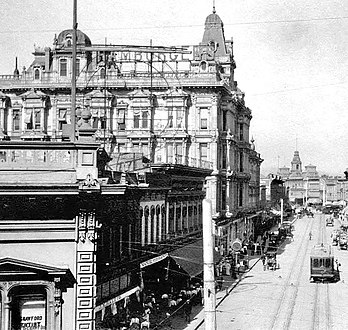 Looking northeast on Spring Street from First Street, 1890s. Hamburger's Peoples Store now in the Phillips Block at center. Electric streetcars replaced horsecars and the street is paved. Today, this is the site of City Hall.